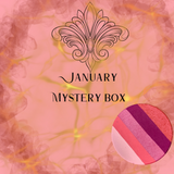 Promotional graphic for 'January Mystery Box' with a moon water liner "candy hearts" sample on a pink and gold background.