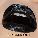 LIP SWATCH OF THE EMBALMING HYDRATING LIPGLOSS IN 
#SHADES_BLACKED OUT