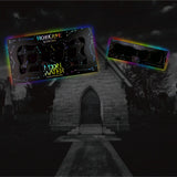 TWO HOLOGRAVE COSMETICS BUILD YOUR OWN MOON WATER LINER PALETTES (WATER ACTIVATED EYELINER)  IN VARIANTS OF 18 PANS AND 4 PANS WITH RAINBOW AURA SURROUNDING THEM IN FRONT OF A MAUSOLEUM TYPE CEMETERY BUILDING WITH A WALKWAY LEADING UP