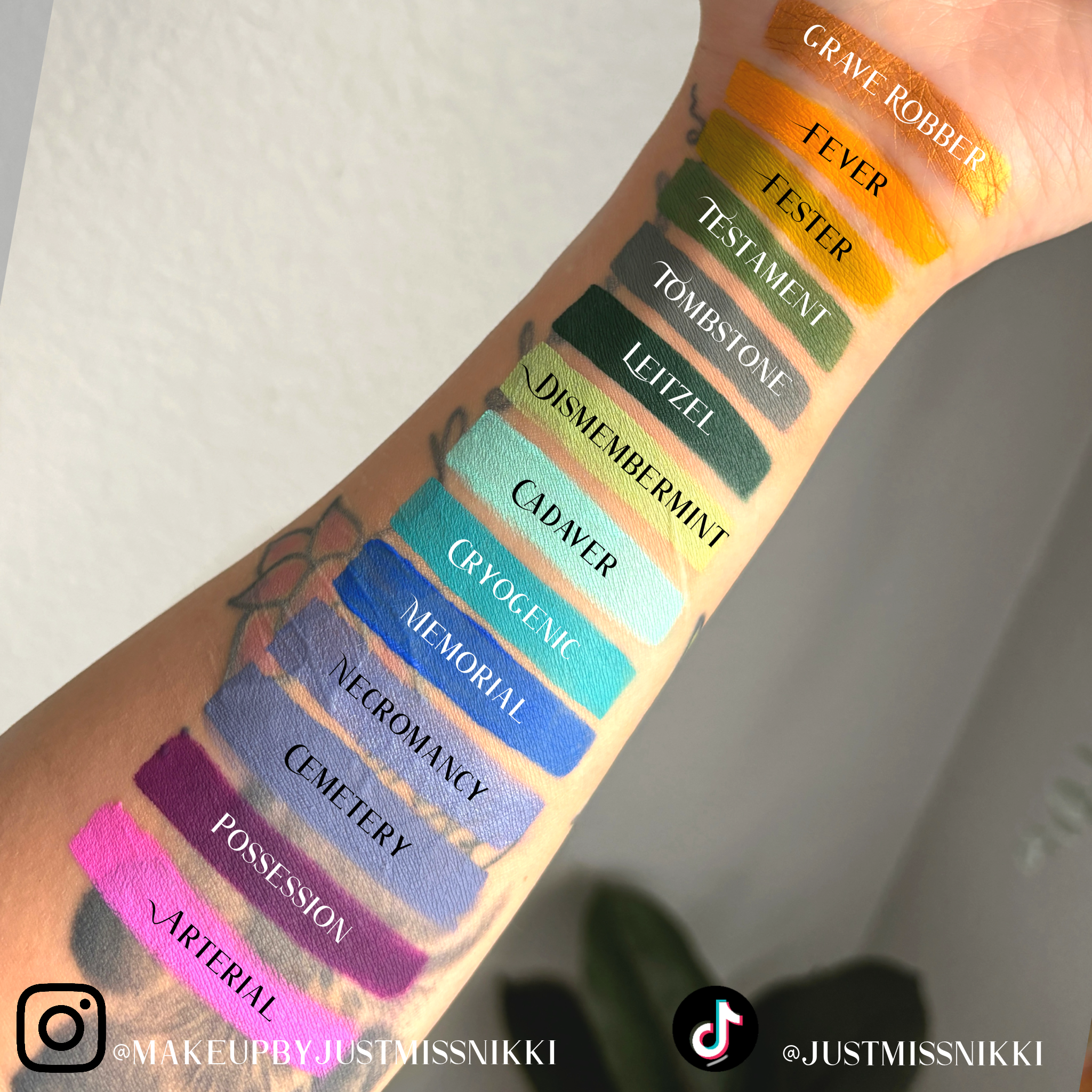 light SKIN TONE ARM SWATCH WITH FUNERAL PROOF EYELINER SWATCHES #shades_grave robber (metallic shimmer),fever,fester,testament,tombstone,leitzel,dismembermint,cadaver,cryogenic,memorial,necromancy (metallic shimmer),cemetery,possession,arterial