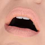 HOLLOWED COSMETICS LIP MUD CLOSE UP SHOT OF SHADE HB 345 A PALE NUDE